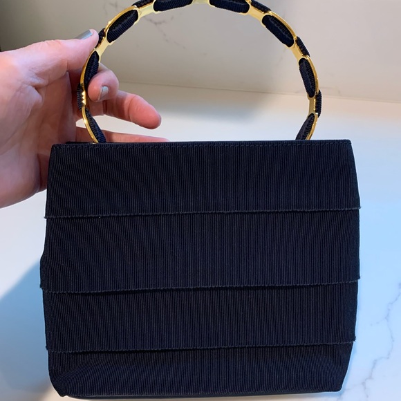 Navy blue Ferragamo fabric bag with beautiful gold signature handle. - Picture 4 of 14